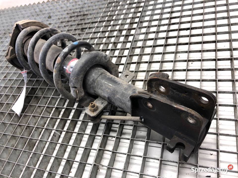 AMORTYZATOR PRAWY PRZÓD ZE SPRĘŻYNĄ RENAULT osobowe