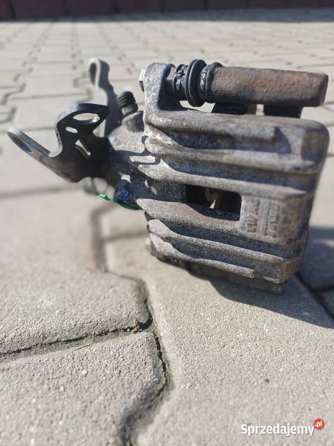 Zacisk hamulcowy z jarzmem oryginalny lewy tył Wodzisław Śląski