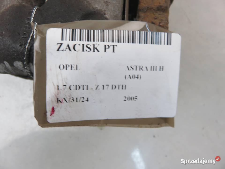 ZACISK PRAWY TYŁ OPEL ASTRA III H