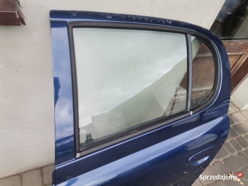 DRZWI LEWY TYŁ TOYOTA YARIS 1 8K8 Nowy Sącz sprzedam