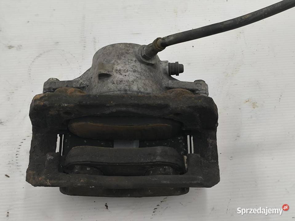 ZACISK LEWY PRZÓD MERCEDES C W204 LIFT 18 CGI osobowe sprzedam