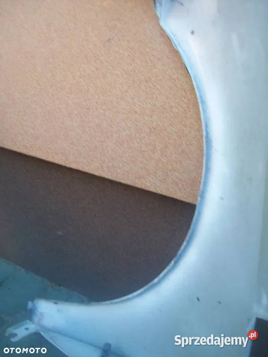 Błotnik prawy Laguna I Radom