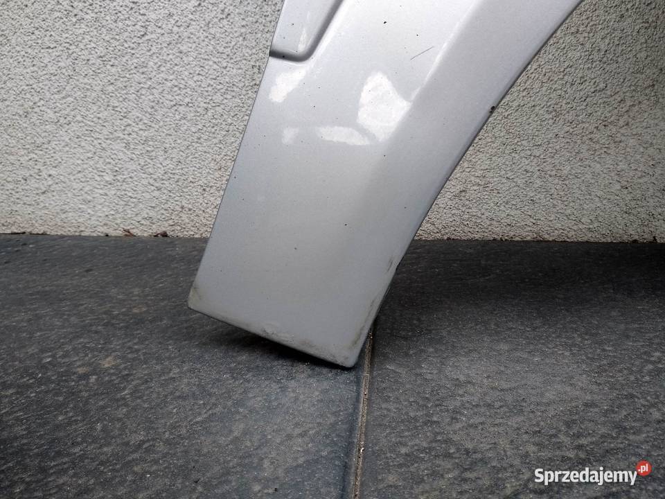 Opel Astra H błotnik przedni lewy srebrny Z157