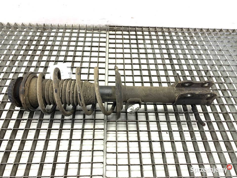 AMORTYZATOR LEWY PRZÓD ZE SPRĘŻYNĄ TOYOTA YARIS