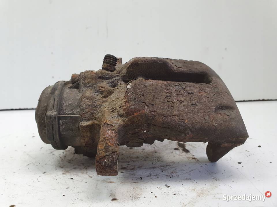 Audi A4 B8 TYLNY ZACISK HAMULCOWY prawy tył Janów