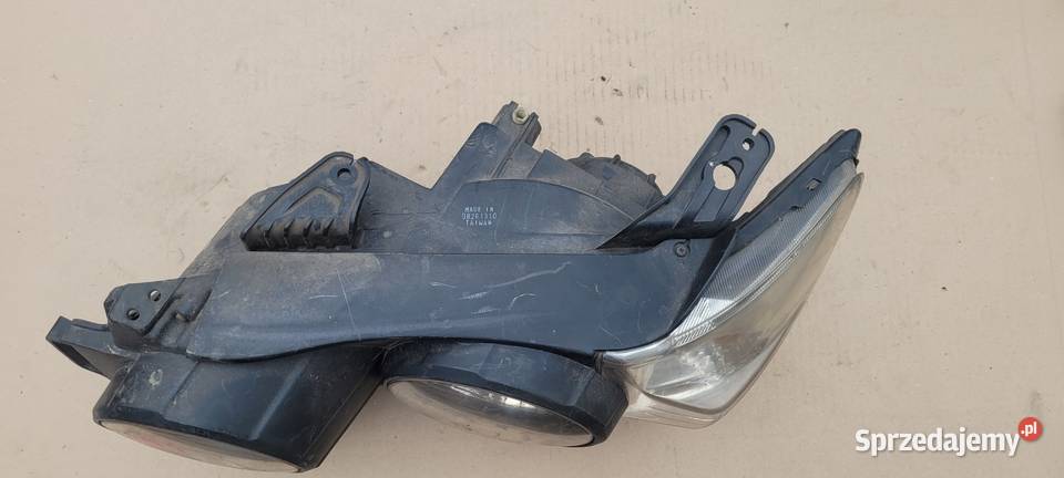 CHEVROLET AVEO T300 LEWY REFLEKTOR LAMPA LEWA