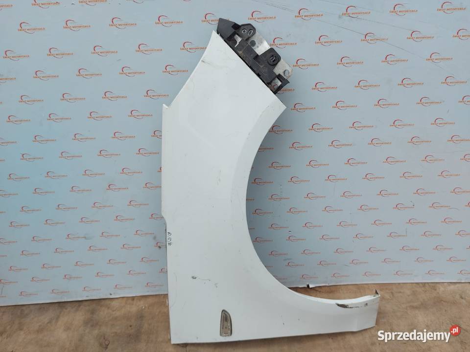 OPEL ZAFIRA TOURER C 13r błotnik prawy przód 140