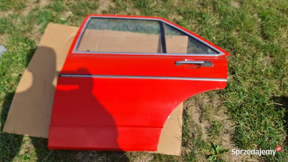 Drzwi lewy tył Audi 80 B1 marsrot L31B Dobrodzień