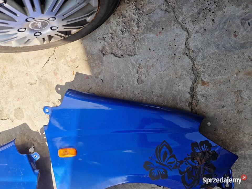 Błotniki Lewy Prawy Daihatsu Cuore Vl 0307r B51 osobowe