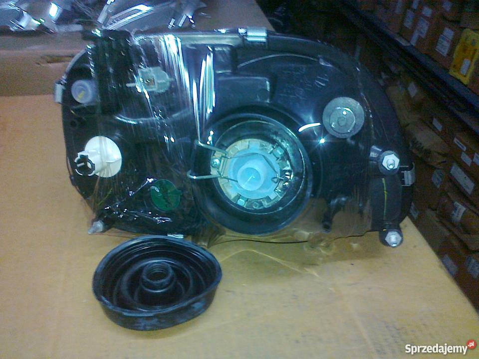 NISSAN MICRA K11 REFLEKTORKIER BIA ELE LEWY NOWY
