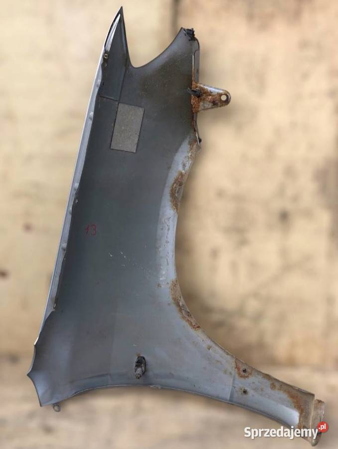 Błotnik lewy przód MITSUBISHI OUTLANDER I do Skołoszów