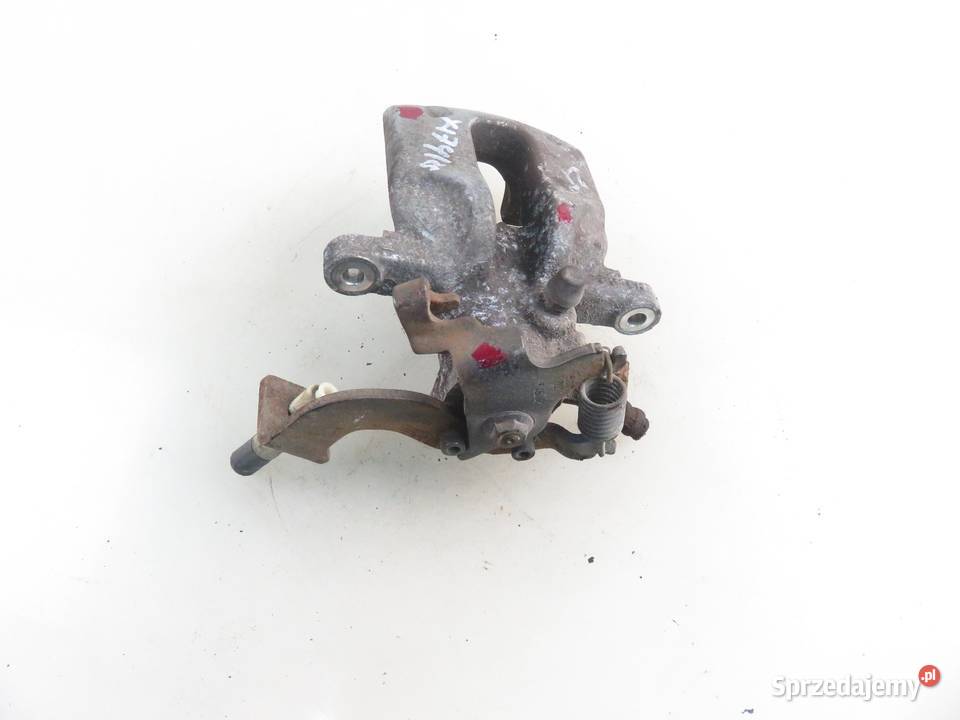 ZACISK LEWY TYŁ TOYOTA AURIS I E15