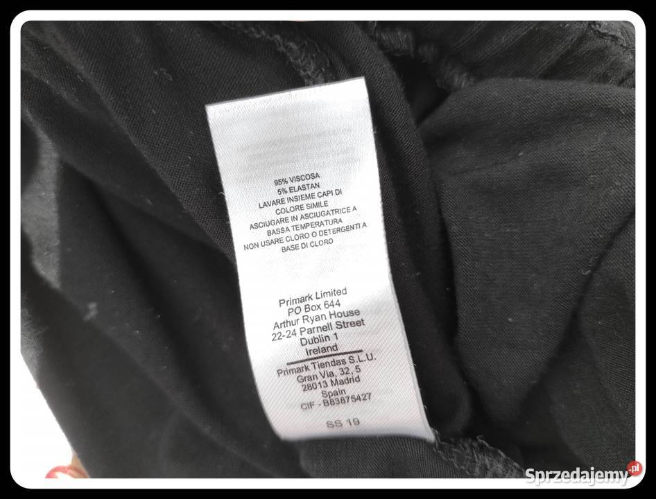 Czarna dopasowana spódnica na gumce z rozcięciem Płock