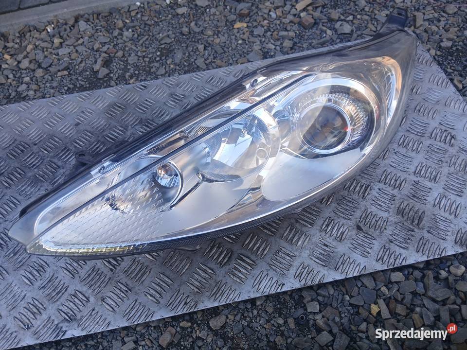 Lampa lewa przód przednia Ford Fiesta mk7 VII EU osobowe małopolskie