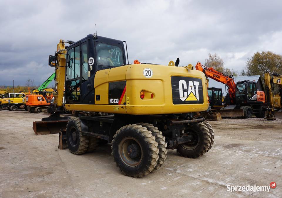 Koparka kołowa CAT M 313 D 2014 Koparki Jeziorko sprzedam