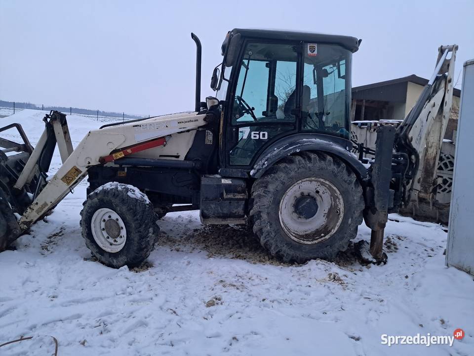 Sprzedam koparko ladowarke Koparki