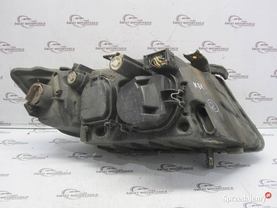 BMW E90 06r lampa lewa przód 6942723 89311650