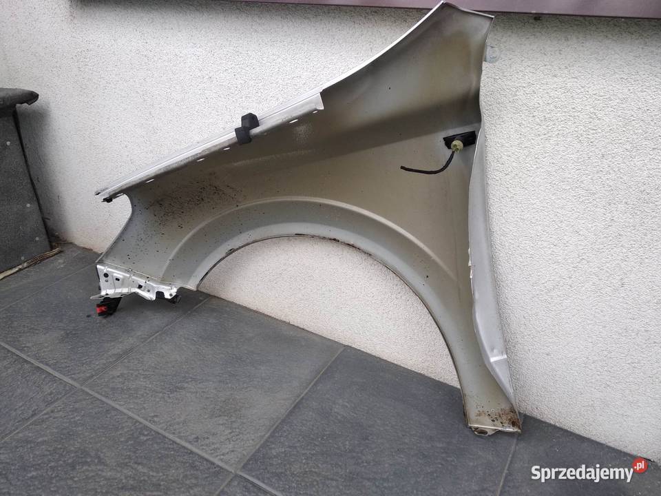 Opel Astra H błotnik przedni prawy srebrny Z157 Sieradz