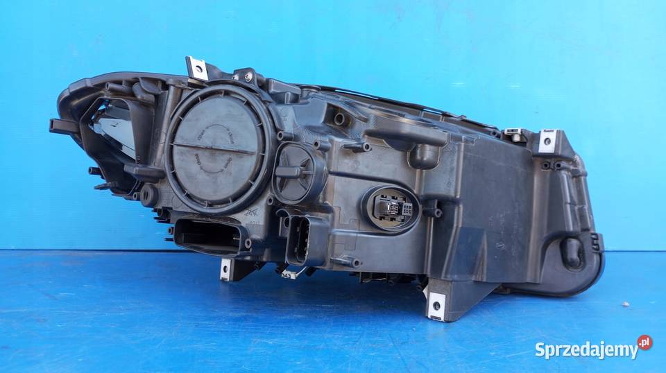 7203245 LAMPA LEWY PRZÓD EU XENON NIESKRĘTNY BMW osobowe Nowy Tomyśl