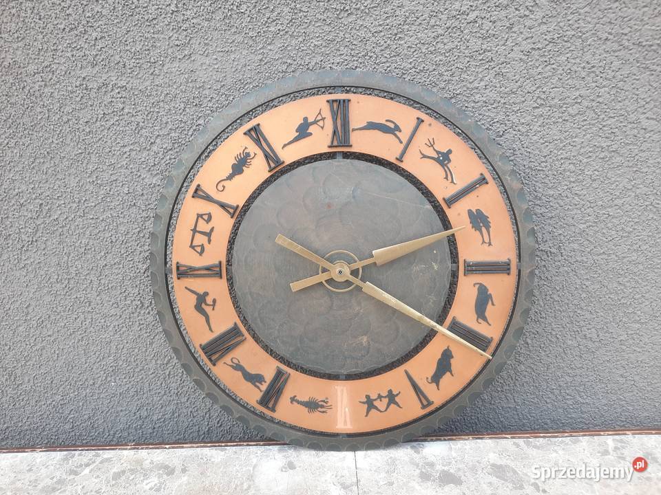 Q23 Zegar ścienny Kienzle znaki zodiaku W276 Ato