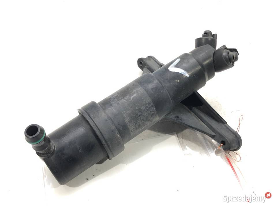 SPRYSKIWACZ REFLEKTORA LEWY BMW E60