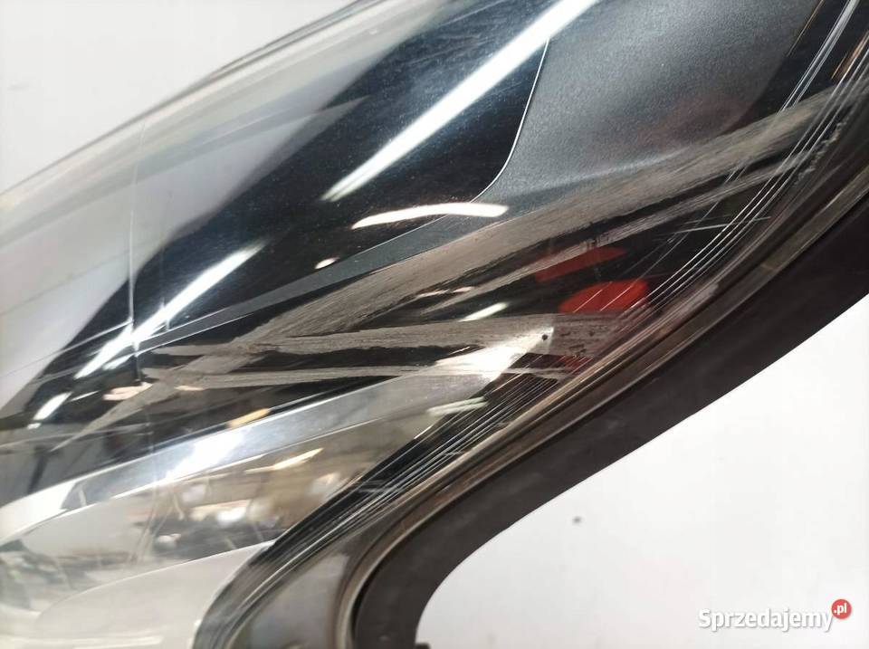 LAMPA PRZÓD LEWA EUROPA USZKODZONA 1EE011410