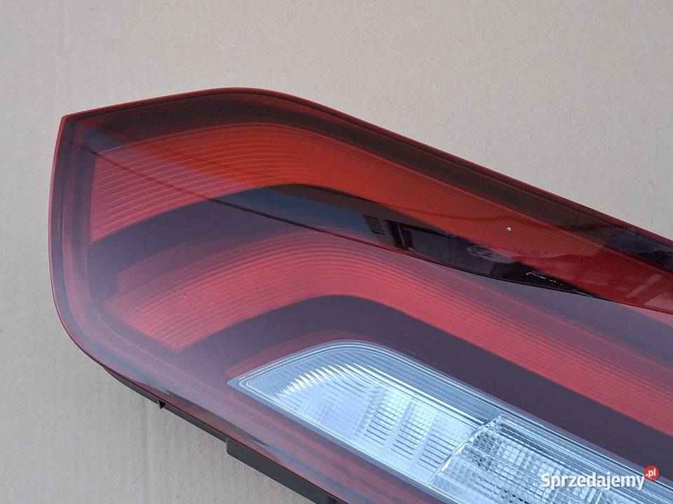 MAN LIONS COACH LAMPA LEWA TYLNA LEWY TYŁ Bieleń