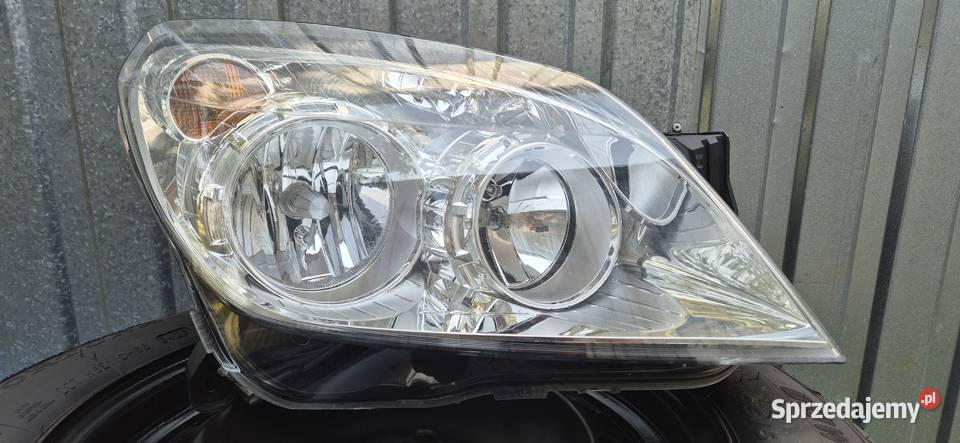 reflektor prawy astra horyg OEM praKtycznie nowy Bełchatów