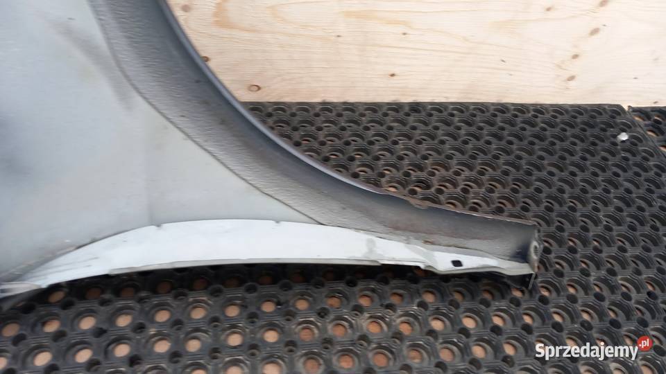 RENAULT LAGUNA III BŁOTNIK PRZÓD LEWY Zbierkowo sprzedam