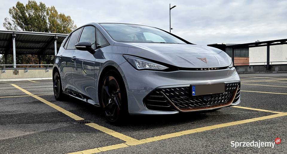 Cupra Born 231 pełna HUD Masaże szklany dach Motoryzacja Łódź