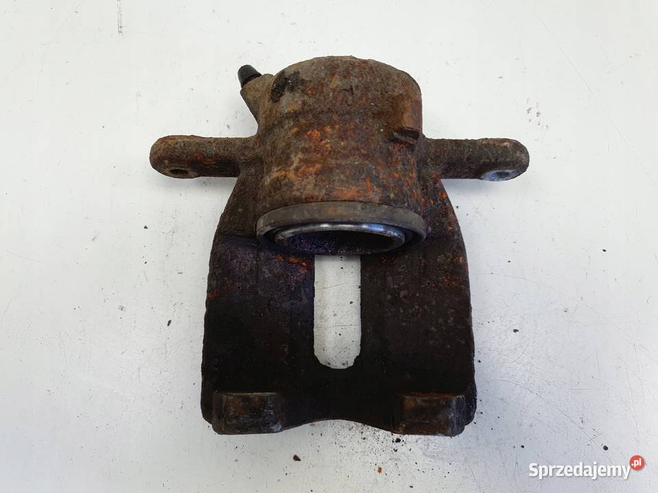 Dacia Lodgy PRZEDNI ZACISK HAMULCOWY lewy przód Rudka