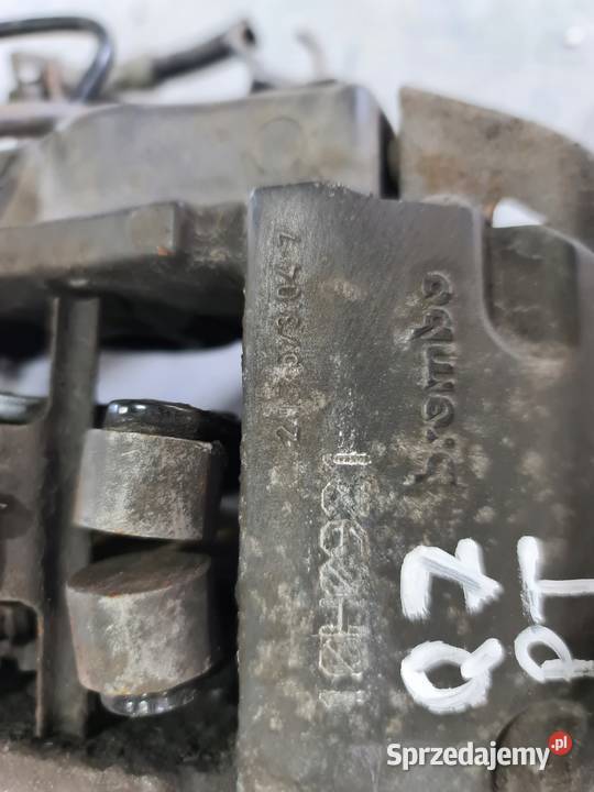 ZACISK HAMULCOWY PRAWY TYŁ AUDI Q7 20767304 osobowe Przystajń sprzedam