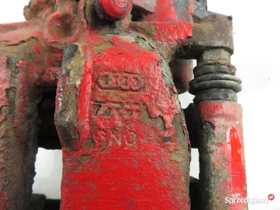 ZACISK LEWY TYŁ AUDI A4 B8 20 TDI 32335478