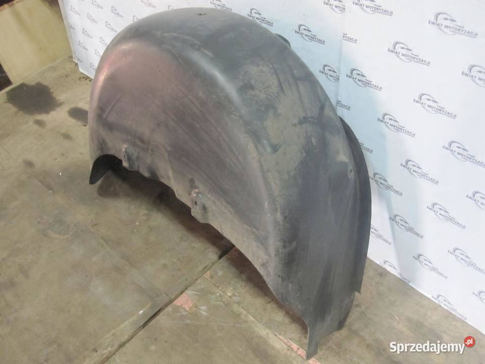 VOLKSWAGEN CADDY III nadkole lewe tył 2K5810971A