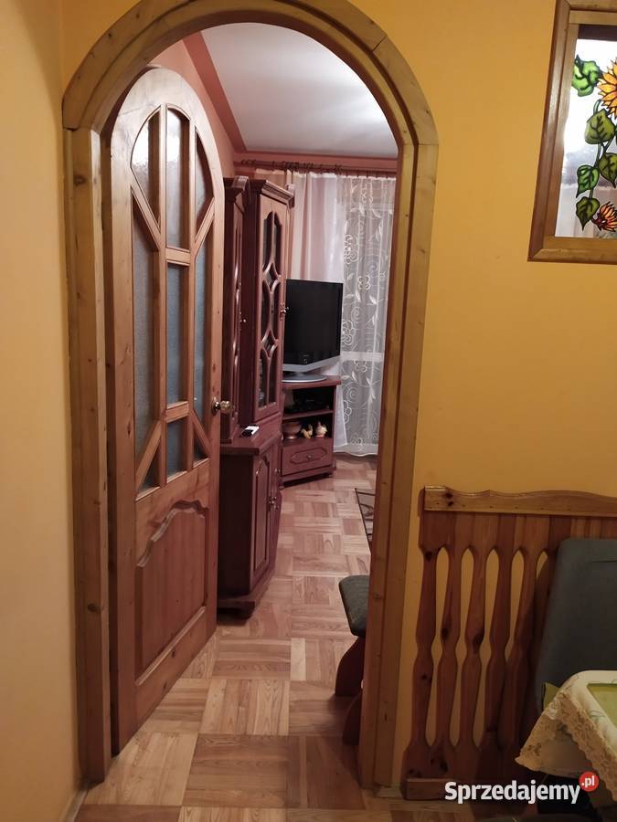 Drzwi z litego drewna z półłukiem robione na Kraków