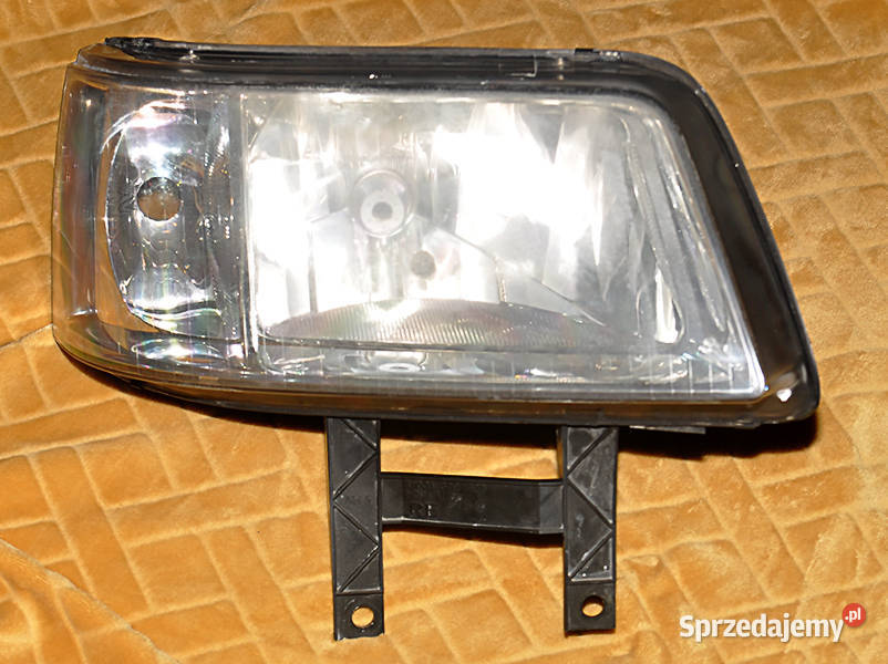 Reflektor prawy VW Transporter 5 OE 7H1941016N EUROPA