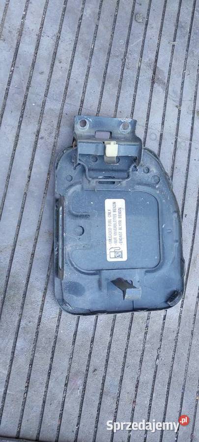 Suzuki Baleno 1996 1998 klapka wlewu paliwa Klapki wlewu paliwa Byków