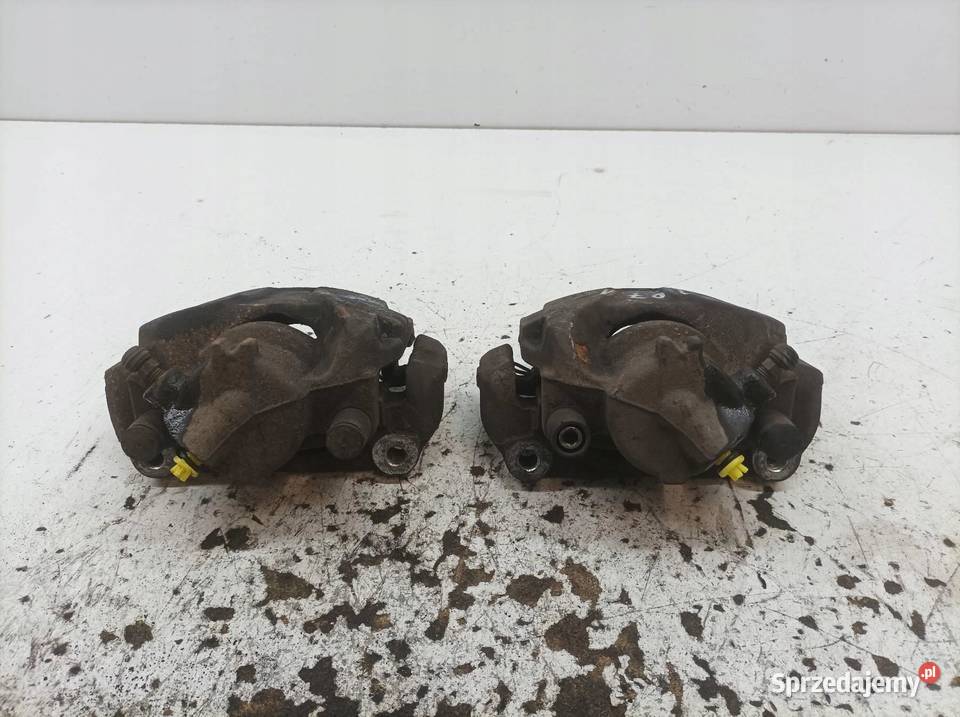 ZACISK HAMULCOWY PRAWY LEWY PRZÓD 15 DCI KPL