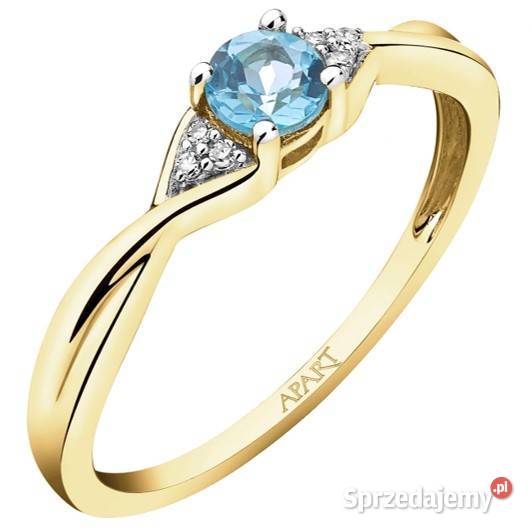 Złoty pierścionek 9K 375 z błękitnym topazem i Warszawa