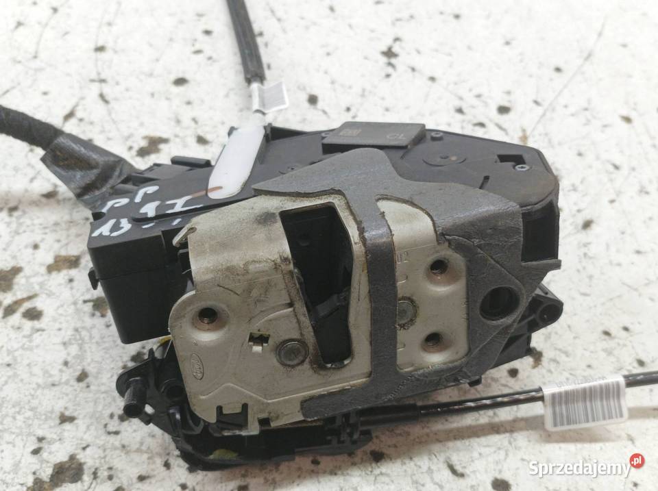 ZAMEK DRZWI PRAWY PRZÓD EUROPA AM5AU21812BF Ford