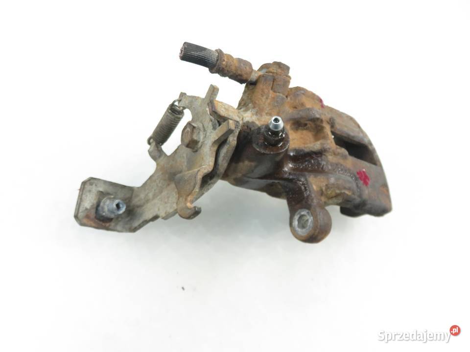 ZACISK LEWY TYŁ NISSAN ALMERA II N16 osobowe