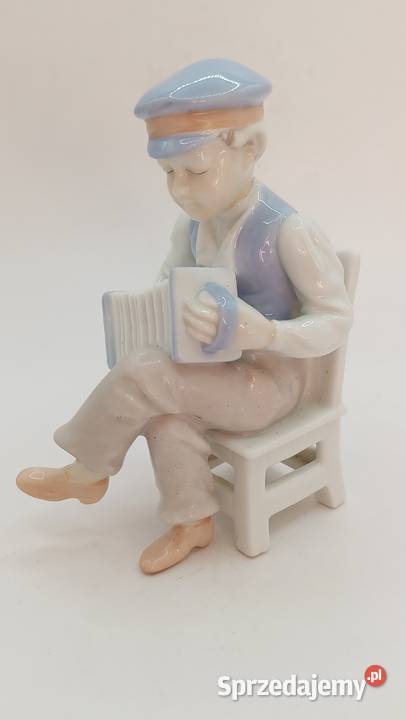 Figurka porcelana chłopiec z akordeonem Zamość