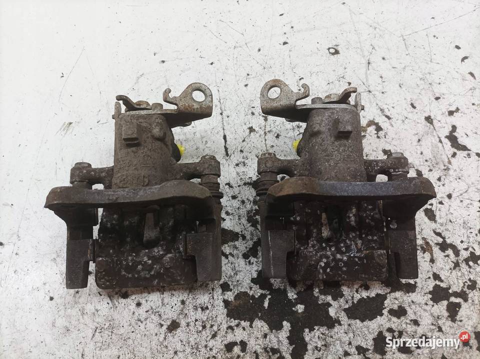 ZACISK HAMULCOWY PRAWY LEWY TYŁ KPL 15 DCI