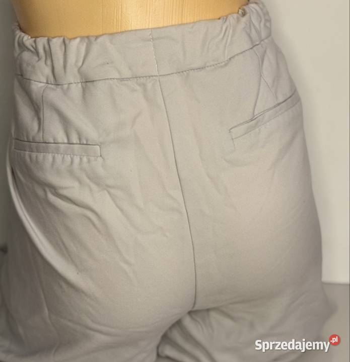 Spodnie Reserved z elastycznym pasem jasnoszare Reserved