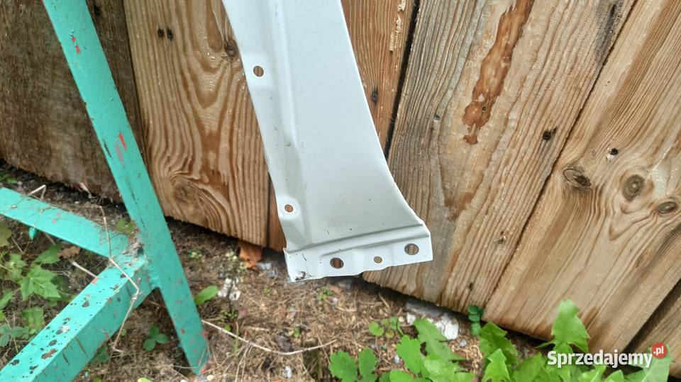 Blotnik lewy przód Aygo X Pilawa