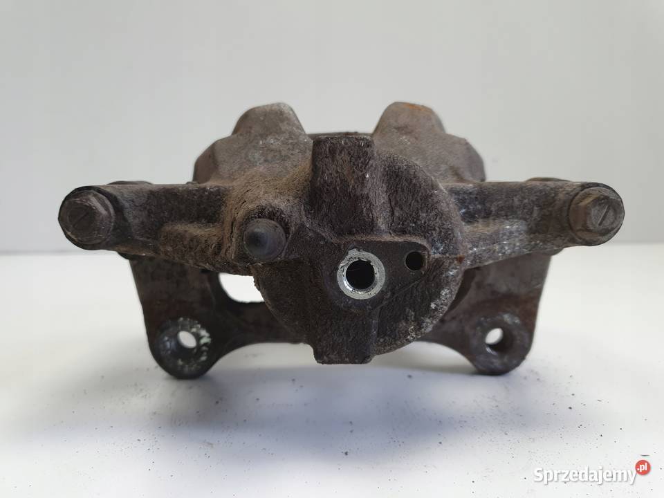 Toyota Corolla XII E21 PRZEDNI ZACISK HAMULCOWY Rudka