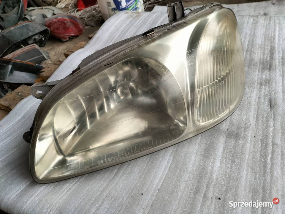 KIA CARNIVAL LAMPA PRZÓD PRZEDNIA LEWA lampy przednie Kamień-Kolonia