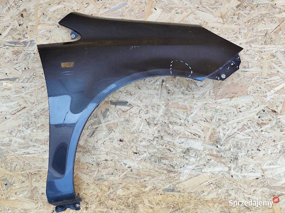 BŁOTNIK PRAWY PRZÓD PRZEDNI OPEL CORSA D 0611R osobowe Przemęt