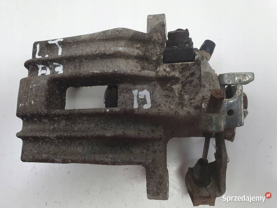 VW Golf IV Bora Audi A3 Toledo II LEWY ZACISK Chełm