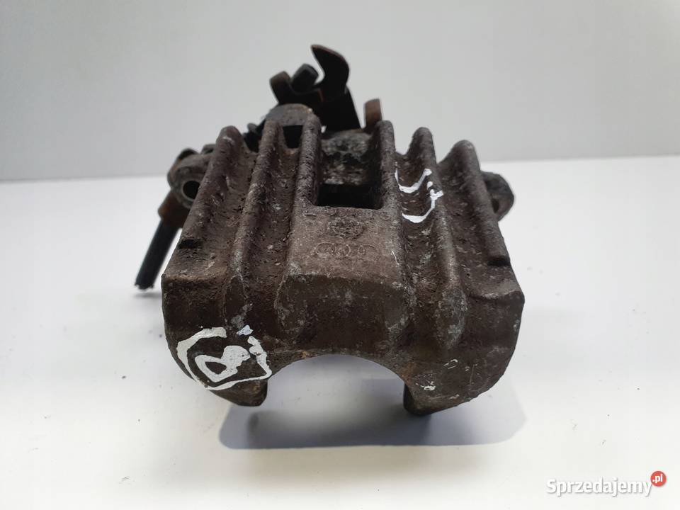 Vw Passat B5 Audi A4 B5 ZACISK HAMULCOWY Lewy Zaciski i jarzma